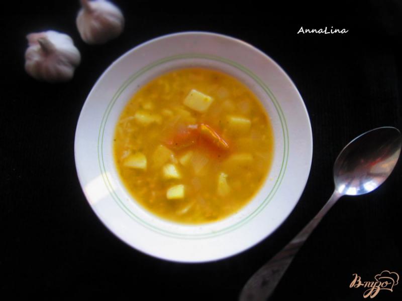 Фото приготовление рецепта: Рисовый суп с тыквой шаг №4