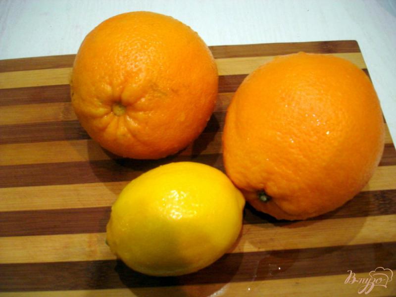 Фото приготовление рецепта: Напиток из апельсинов и лимона шаг №1