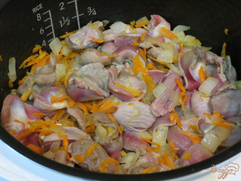 Фото приготовление рецепта: Куриные желудочки в мультиварке шаг №6