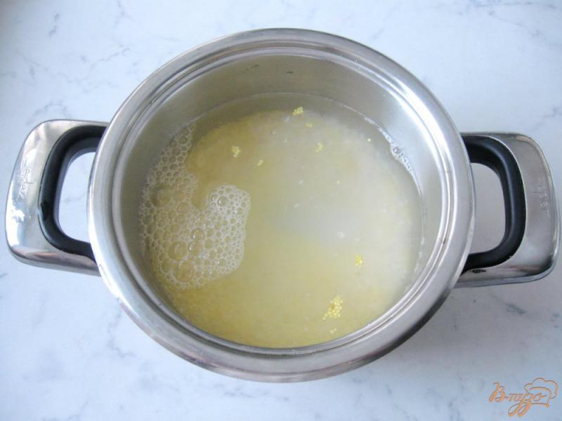 Фото приготовление рецепта: Молочная каша из пшена с рисом шаг №3