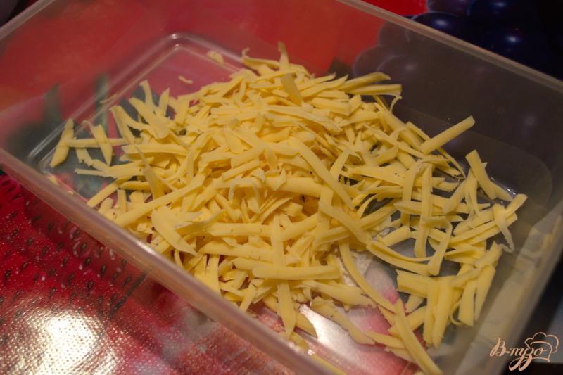 Фото приготовление рецепта: Гренки в духовке с сыром и чесноком шаг №2