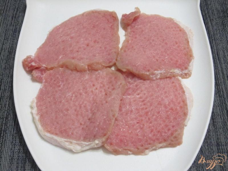 Фото приготовление рецепта: Свиные отбивные с овощами шаг №3