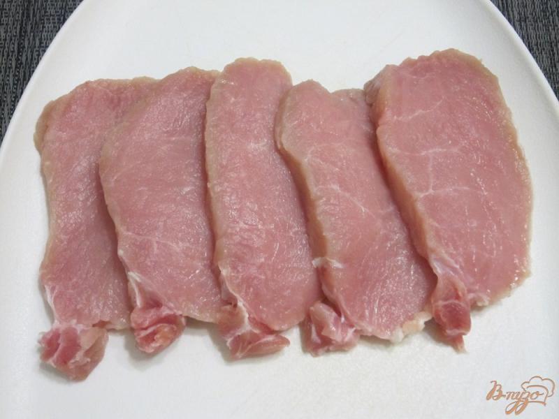 Фото приготовление рецепта: Свиные отбивные с овощами шаг №2