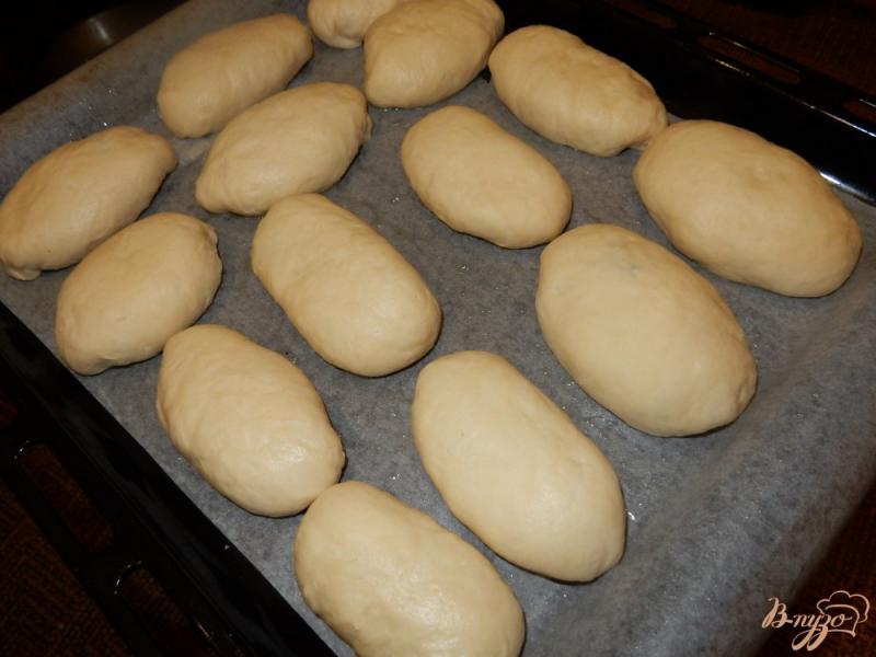 Фото приготовление рецепта: Пирожки с квашеной капустой шаг №10