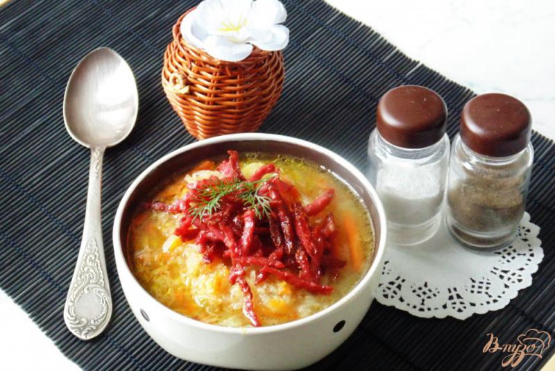 Фото приготовление рецепта: Картофельный суп с квашенной капустой шаг №11
