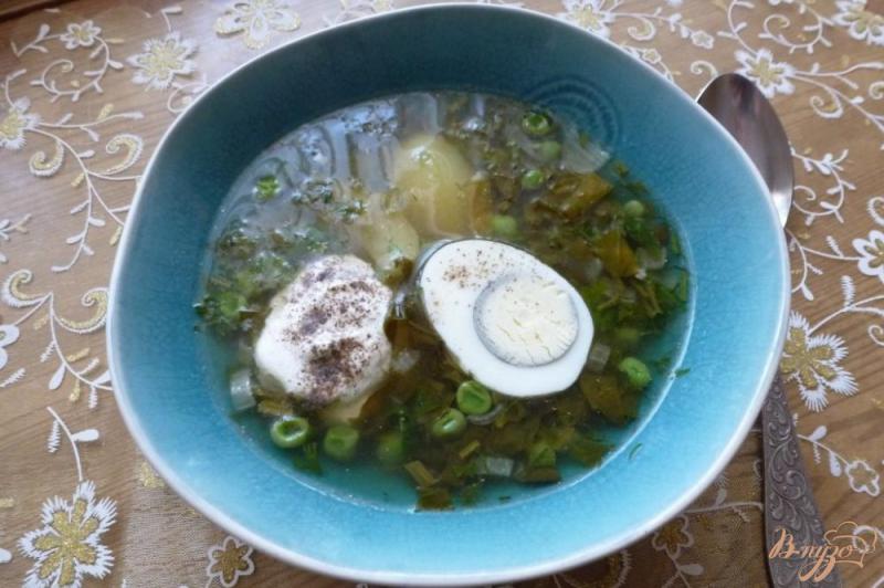 Фото приготовление рецепта: Суп с зеленым горошком и щавелем шаг №7
