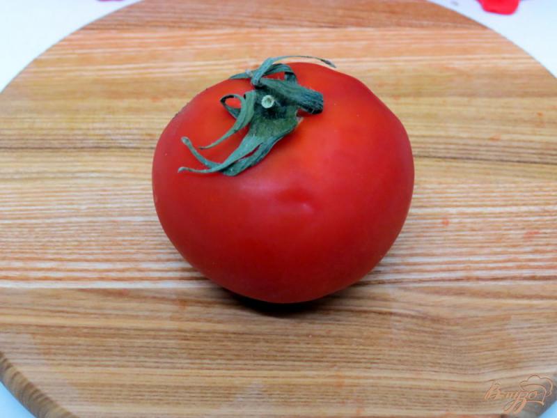 Фото приготовление рецепта: Хек запеченный с помидорами шаг №5