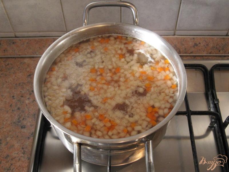 Фото приготовление рецепта: Суп с рисом и чечевицей шаг №5