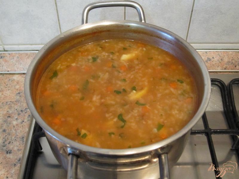 Фото приготовление рецепта: Суп с рисом и чечевицей шаг №7