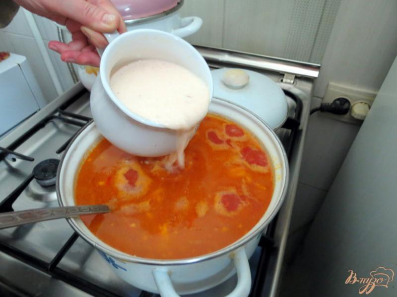 Фото приготовление рецепта: Томатный суп с рисом шаг №9