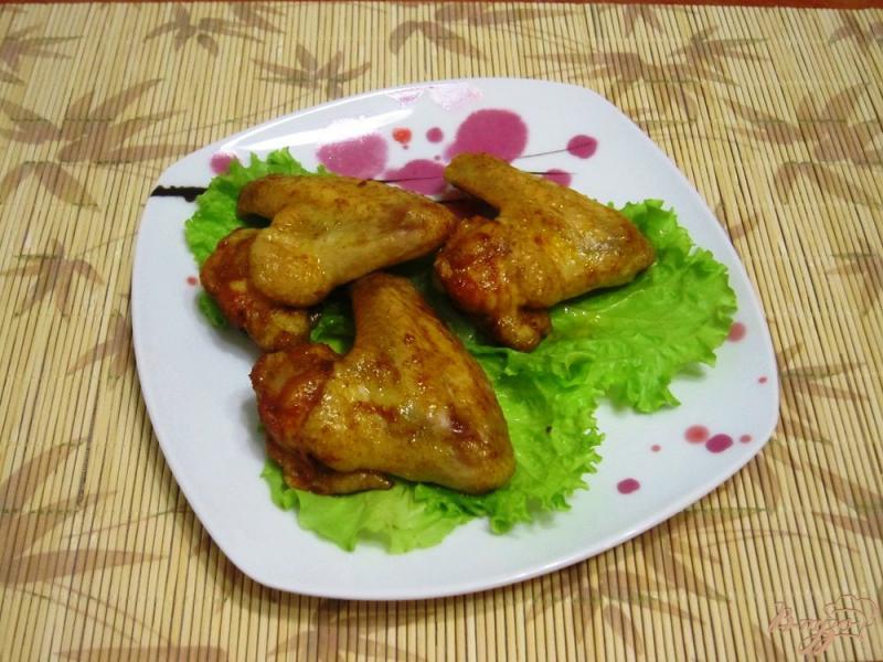 Фото приготовление рецепта: Запеченные куриные крылья шаг №7