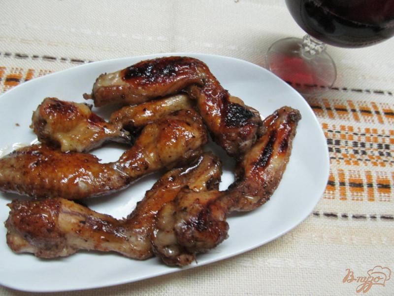 Фото приготовление рецепта: Куриные крылья в медовом соусе шаг №7