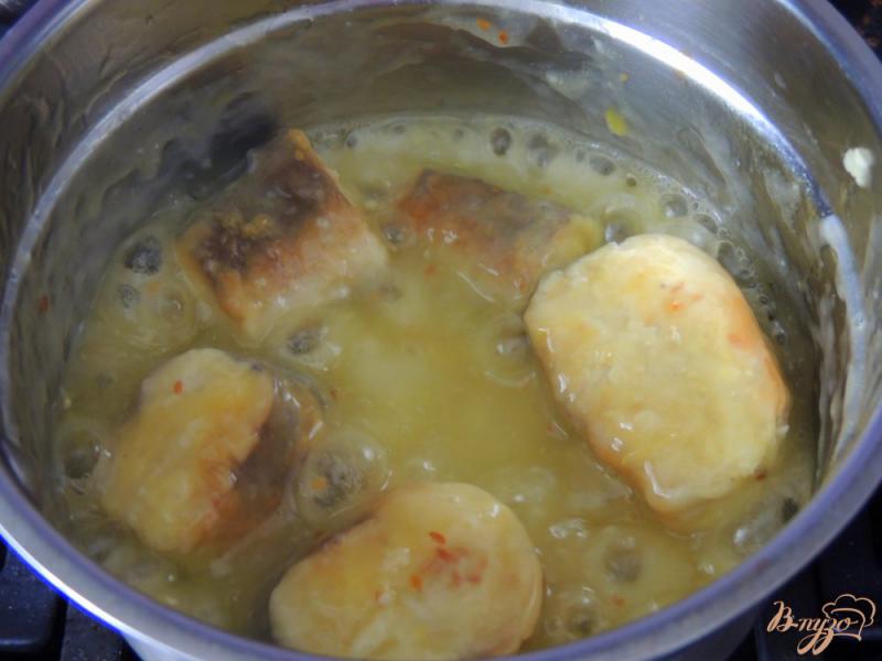 Фото приготовление рецепта: Рыба в апельсиновом соусе шаг №7