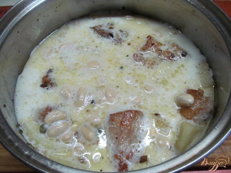 Фото приготовление рецепта: Свинина с каперсами картофелем и фасолью шаг №8