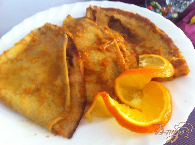 Фото приготовление рецепта: Десерт «Креп- сюзетт» с апельсиновым соусом шаг №9