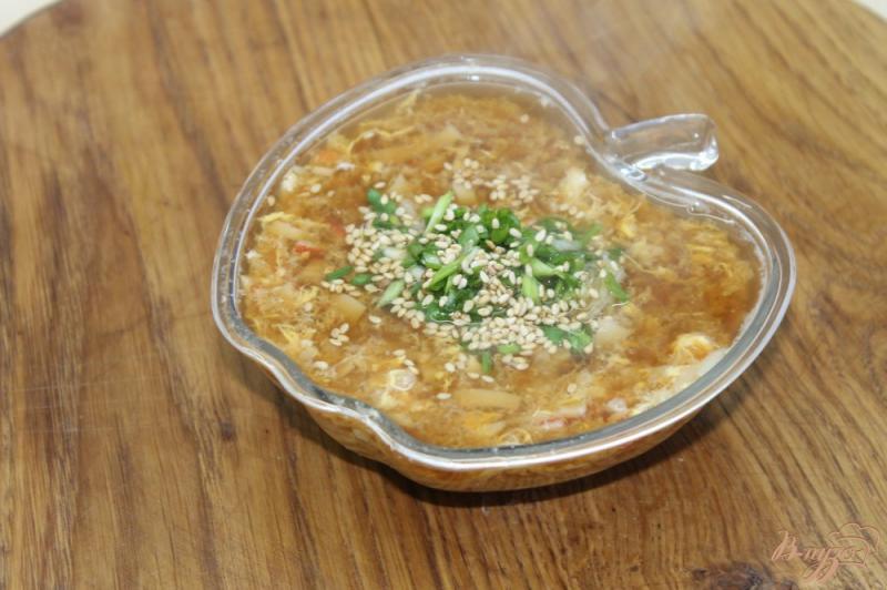 Фото приготовление рецепта: Суп с крабовыми палочками и рисом шаг №7