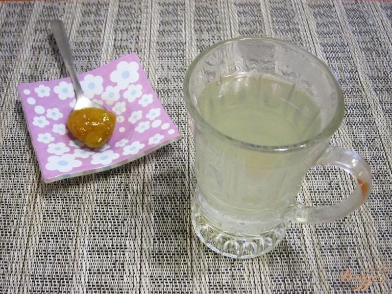 Фото приготовление рецепта: Чай с имбирем и лимоном шаг №8