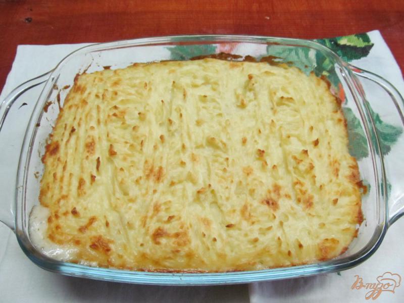 Фото приготовление рецепта: Запеканка из свинины картофеля в сметане шаг №11