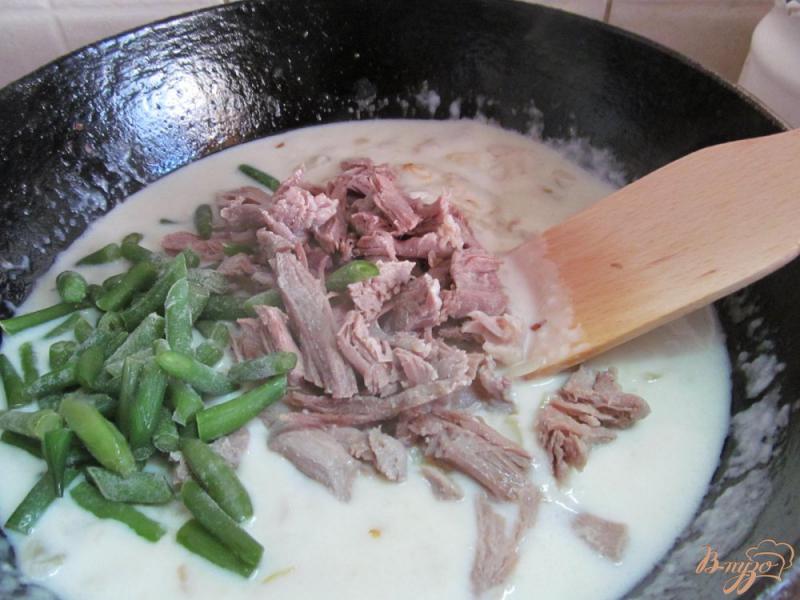 Фото приготовление рецепта: Запеканка из свинины картофеля в сметане шаг №6