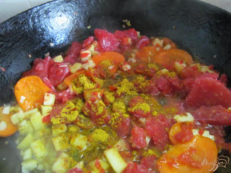 Фото приготовление рецепта: Томатный суп карри шаг №7
