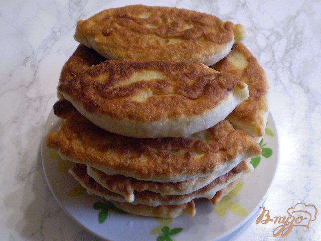 Фото приготовление рецепта: Пирожки с жареными грибами и капустой шаг №12