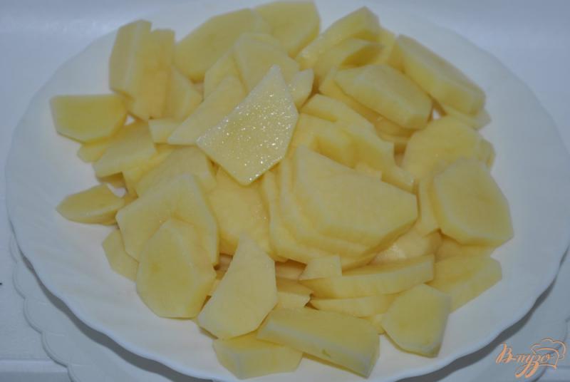 Фото приготовление рецепта: Кальмары с картофелем в сметанном соусе шаг №6