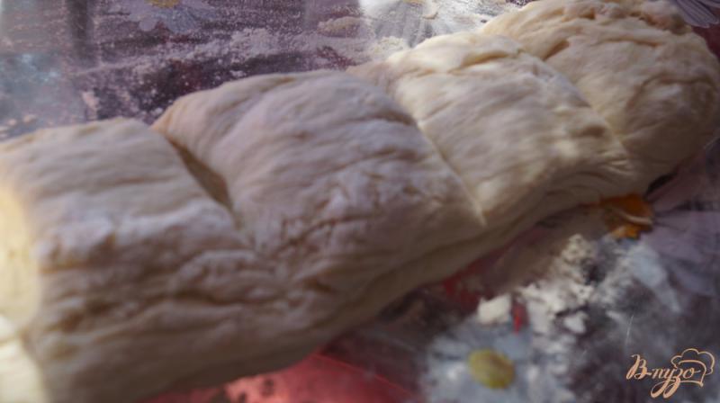 Фото приготовление рецепта: Сладкие багеты с изюмом шаг №5