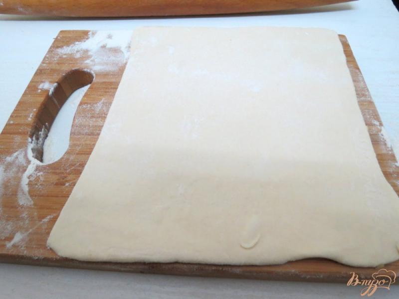 Фото приготовление рецепта: Слоёный пирог с повидлом шаг №2