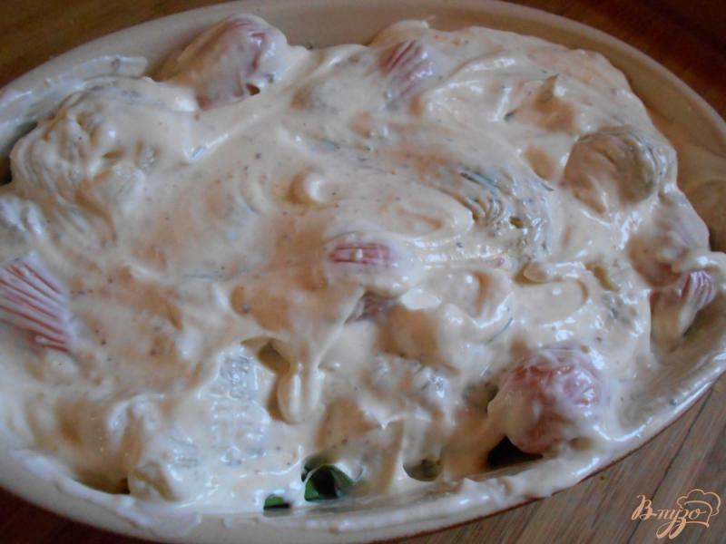 Фото приготовление рецепта: Цветная капуста с сосисками в пикантном соусе шаг №6