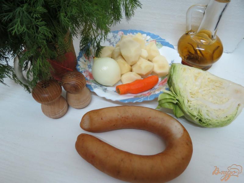 Фото приготовление рецепта: Суп с колбасками и с капустой шаг №1