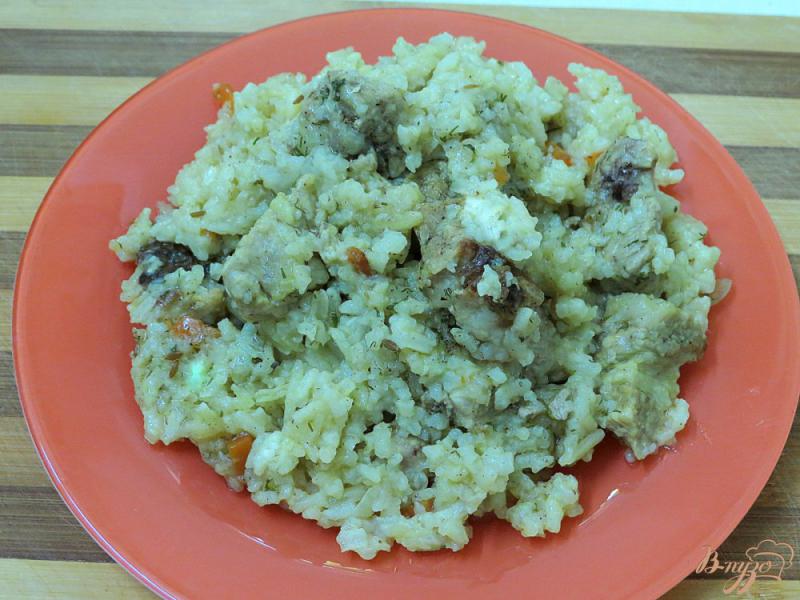 Фото приготовление рецепта: Рисовая каша со свининой в мультиварке шаг №9