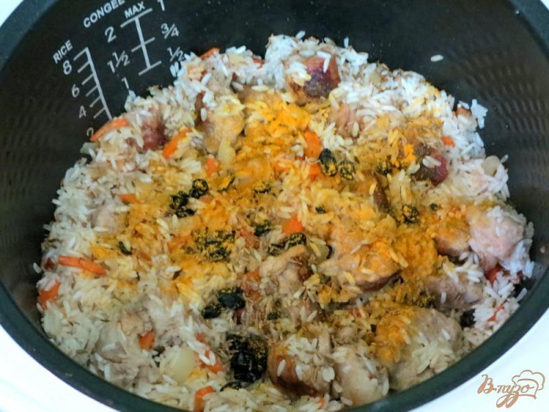 Фото приготовление рецепта: Рисовая каша со свининой в мультиварке шаг №7