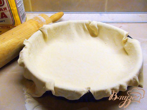 Пирог из слоёного теста с начинкой из фарша и кислой капусты. Пирог из слоёного теста с начинкой из фарша и кислой капусты.
