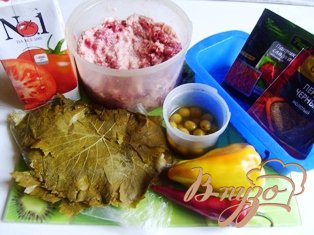 Мясной рулет в виноградный листиях Мясной рулет в виноградный листиях