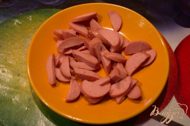 Рецепт Горячие яйца фламенко с сосисками.