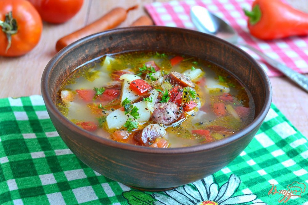 Суп с рисом, овощами и охотничьими колбасками Суп с рисом, овощами и охотничьими колбасками