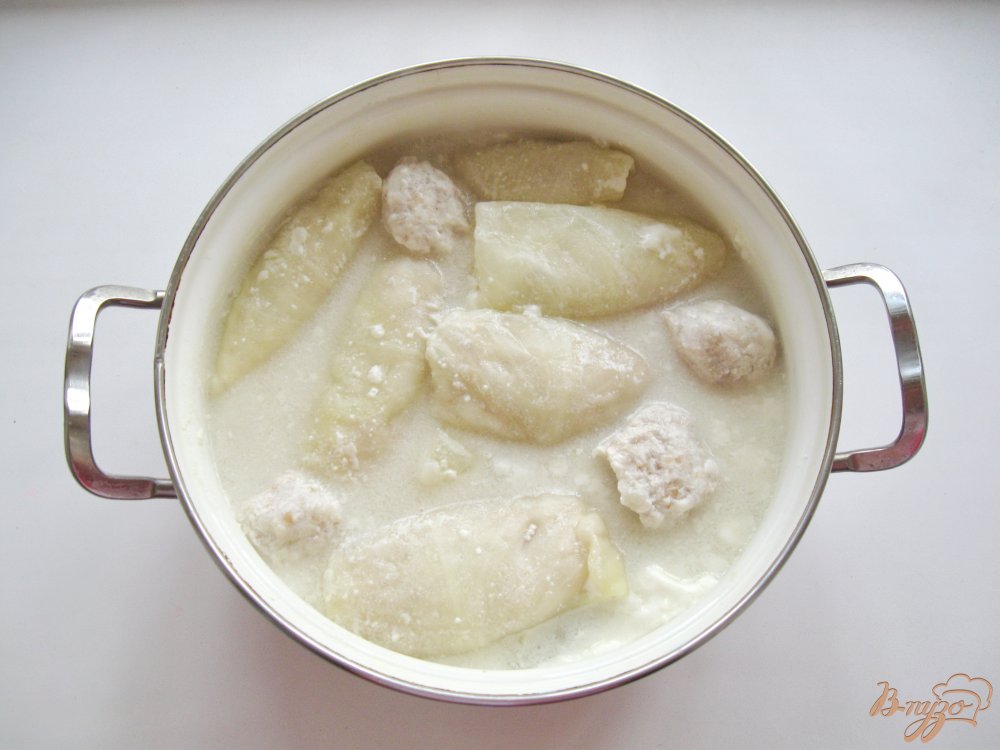 Фото приготовление рецепта: Голубцы с мясом в сметане шаг №7