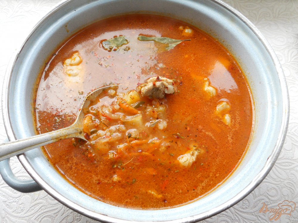 Фото приготовление рецепта: Суп с перловкой и мясом шаг №8