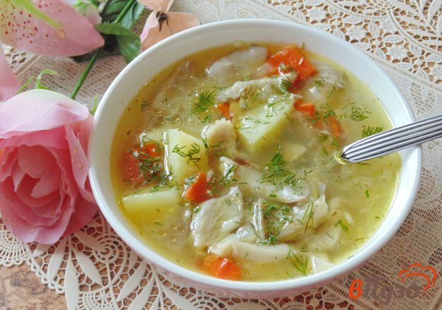 фото рецепта: Рисовый суп с грибами и чесноком