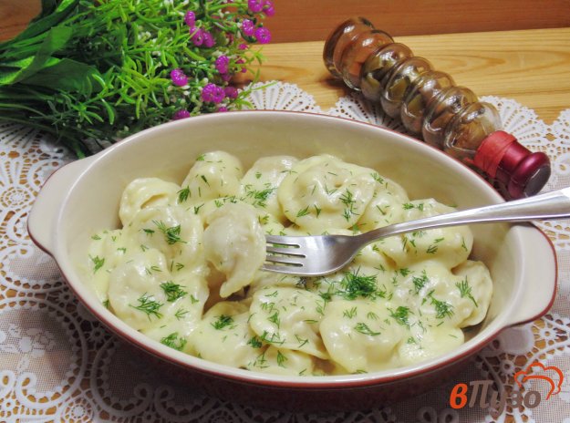 фото рецепта: Пельмени с сыром в духовке