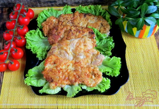 фото рецепта: Куриные отбивные из бёдер с чесноком